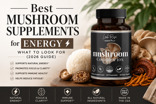 Leah Rose Essentials Mushroom Complex surrounded by functional mushrooms for a guide on the best mushroom supplements for energy, focus, immune support, and daily wellness.