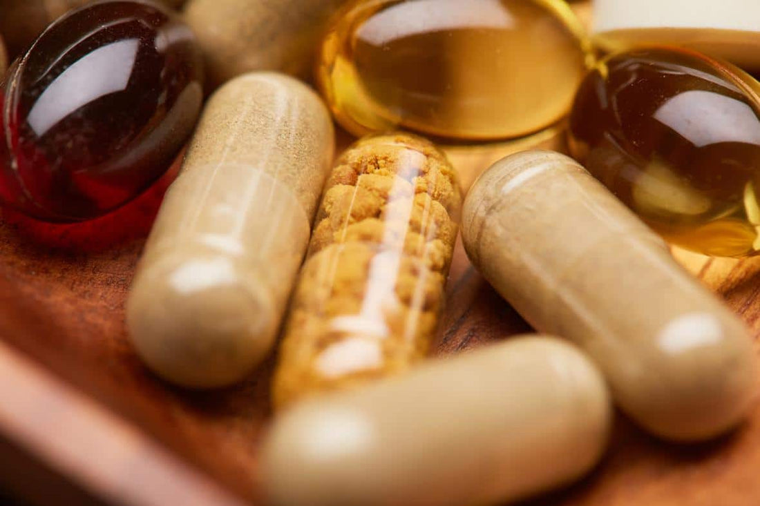 Stack of different supplement pills and capsules representing how to choose the right dietary supplements
