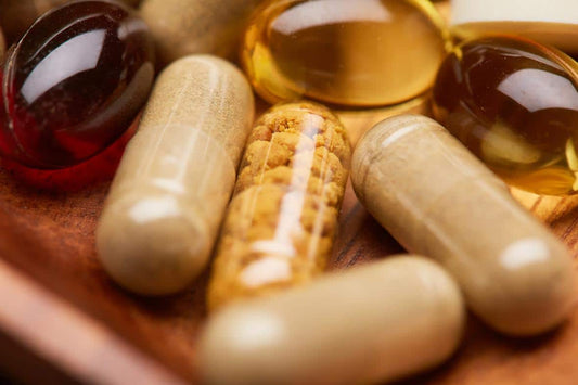 Stack of different supplement pills and capsules representing how to choose the right dietary supplements