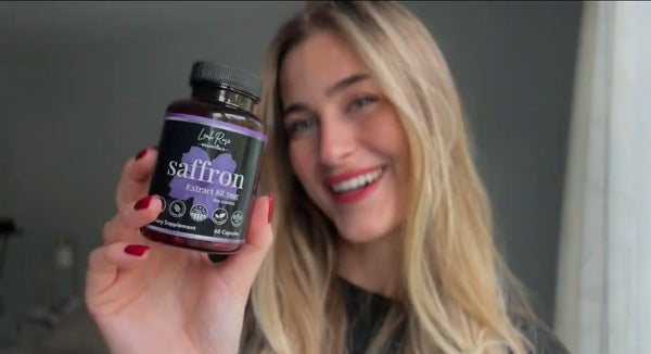 woman holding a bottle of our all natural saffron supplement featuring 88.5mg of saffron extract