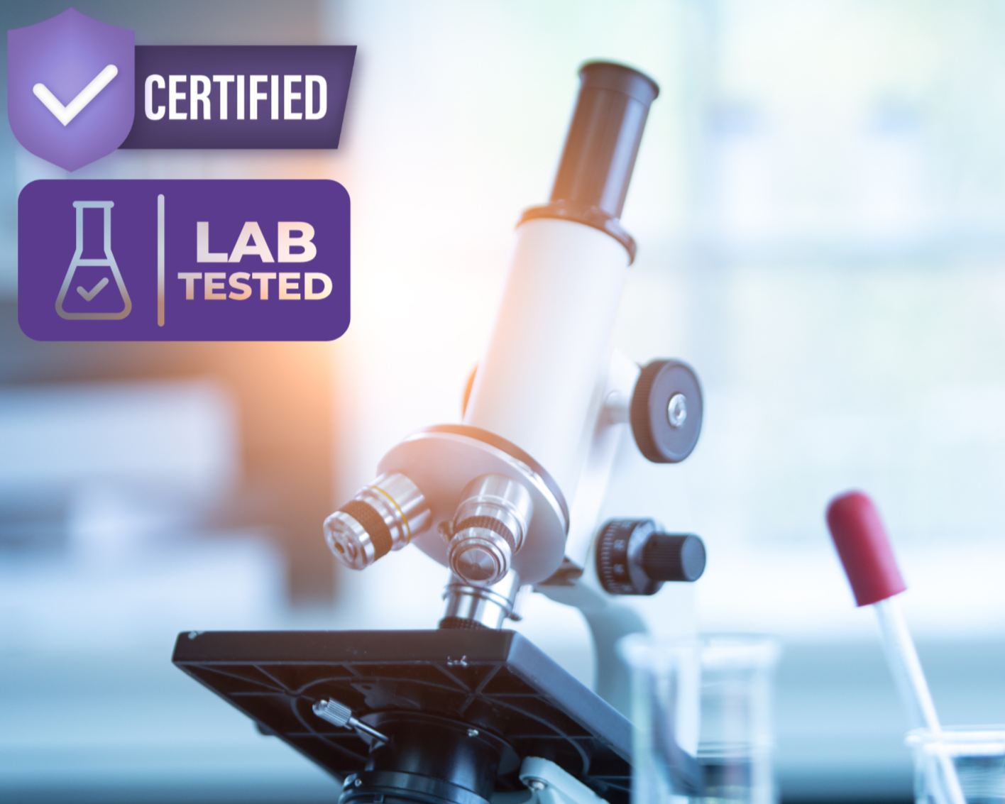 Microscope with lab tested certification badge on a blurred laboratory background